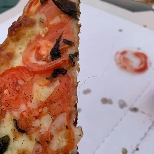 Hair baked in the pizza dough...