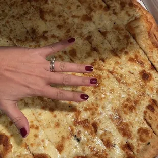 Their world famous garlic bread smothered with mozzarella cheese
