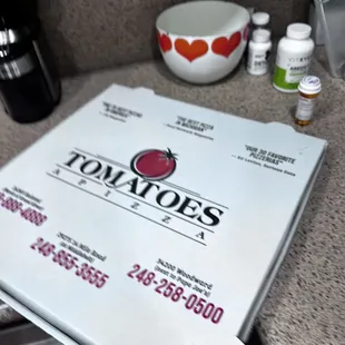a pizza box on a counter