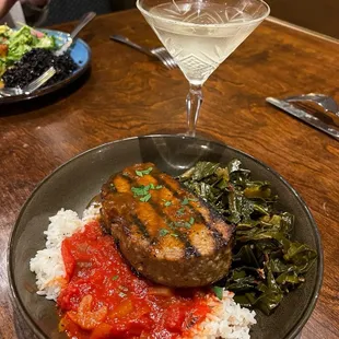 Meatloaf with tomatoes and rice and collard greens