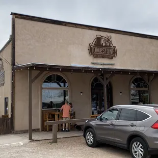 a car parked in front of the building