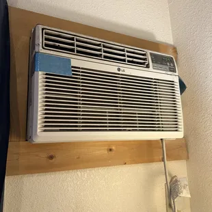 The AC was kept together by duct tape and was very loud. It sounded like it was moving back and forth or something was loose in there.