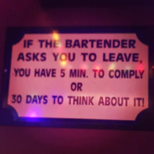 a sign saying if the bartender asks you to leave you have 5 min to comply or 30 days to think