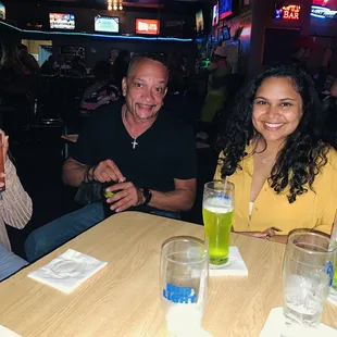 a group of people sitting at a table