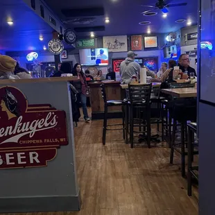 people sitting at the bar