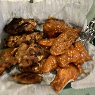 right - grilled dry rub
 left - fried with buffalo garlic