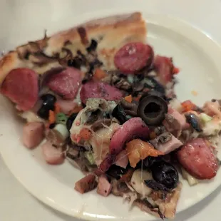 Super deluxe pizza slice