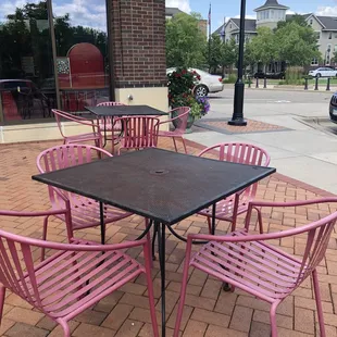 pink chairs and a table