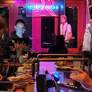 a group of people sitting around a table
