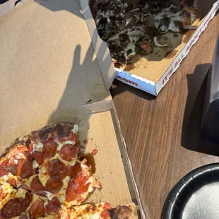 Pepperoni/cheese pizza and pepper and sausage pizza!