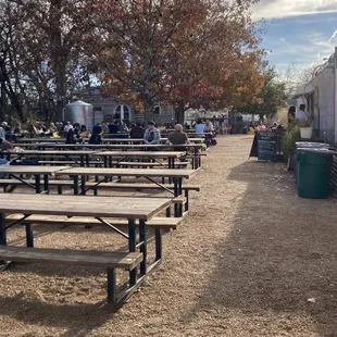 Lots of picnic tables. Gravel ground