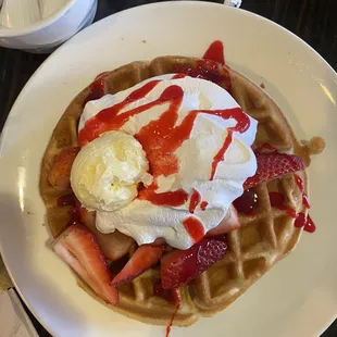 Strawberry waffle with whipped cream