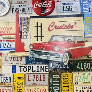 a wall of license plates
