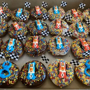 a box of decorated donuts