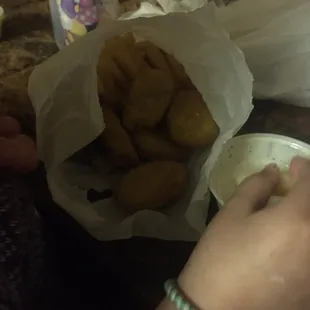 kids chicken nuggets with fries.