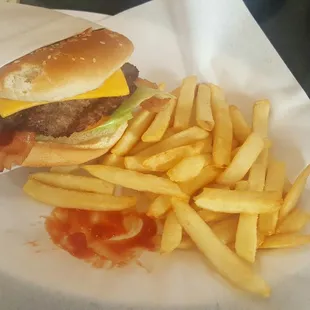 Very delicious bacon cheeseburger combo there's a piece of my breakfast because my little boy took a piece