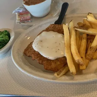 Chicken Fried Steak, French Fries, and broccoli