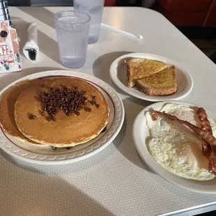 Two Pancakes and Two Two Fresh Eggs served the way you like , with your choice of Bacon , ham , sausage , or ground beef