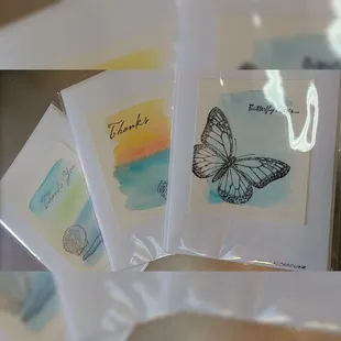 Handstamped and hand painted cards by local artist