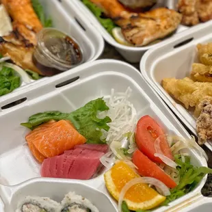 Sashimi and California roll. Salmon cheek in the back. IG: foodie.maps