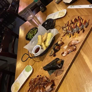 a variety of food on a wooden board