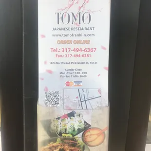 a sign for tomo japanese restaurant