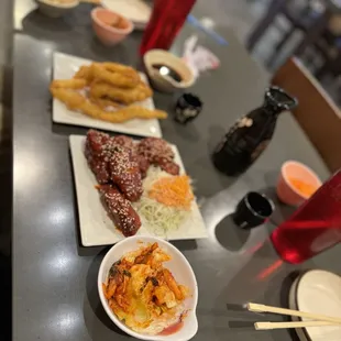 Tempura squid, hot chicken wings &amp; complimentary salad