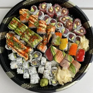 AAC, Christmas, caterpillar, rainbow, salmon king, spicy yellowtail, bluefin tuna avo, Godzilla, sweetheart