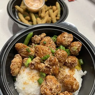 two bowls of food on a table