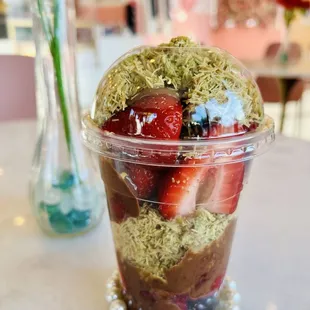 Dubai chocolate strawberry cup.   The pearl bracelet is my daughter's hehe.