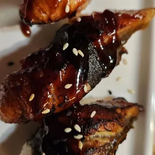 three pieces of meat on a plate