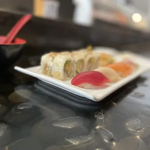 Tuna, mackerel, salmon nigiri