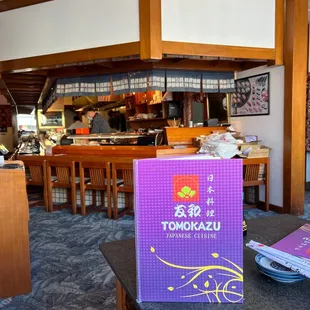 Tatami seating inside looking at sushi bar