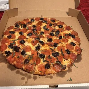 a pepperoni and olive pizza