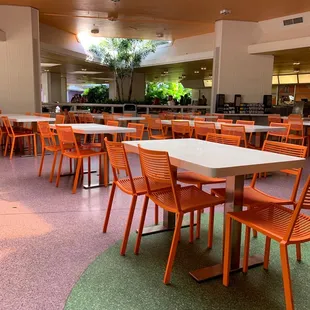 tables and chairs in a cafeteria