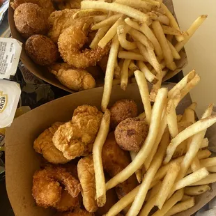 a box of fried chicken and french fries
