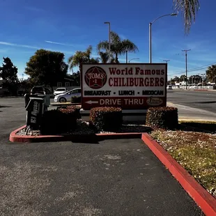  a sign for the world burgers drive thru