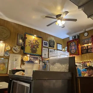 a man sitting at a table in a restaurant