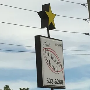 sign at the road (Main Street, East end)