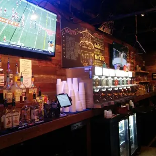 a man watching a football game on tv