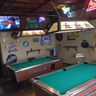 Game room with pool tables and foosball table