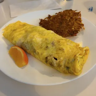 Porter omelette, which has onions and Portuguese linguiça sausage inside, and I asked for the hashbrowns, extra crispy