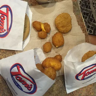 Kid's meal - chicken nuggets with cheese curds. Cookie for dessert.
