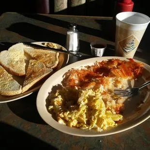 Piping hard eggs with grilled onions, expertly cooked hash browns with butter toast and salsa, and coffee is included! All for under $7.