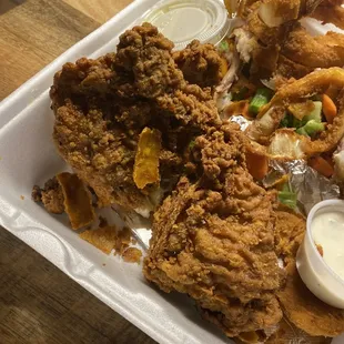 Burnt dried up chicken and dried up onion rings