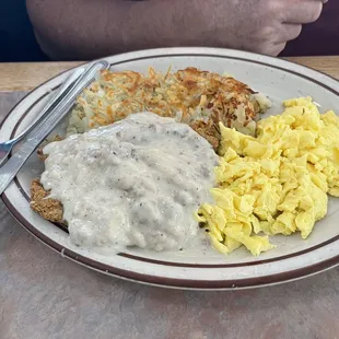 Chicken fried steak and eggs.