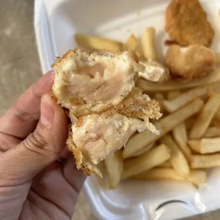 RAW chicken nugget. Do NOT eat here! Reporting to the health department.