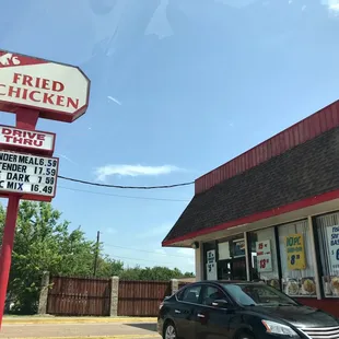 a car parked in front of a restaurant
