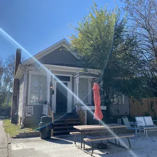 Small building next door with more tables and appears to be party rooms.