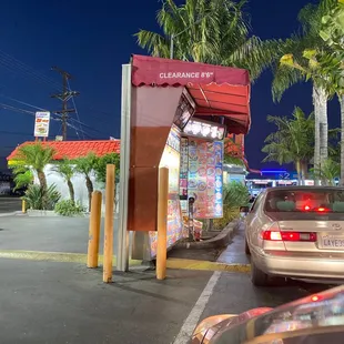 cars parked in front of the restaurant